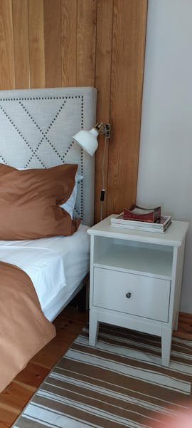 Oak Studio bedroom with bedside tables for extra storage