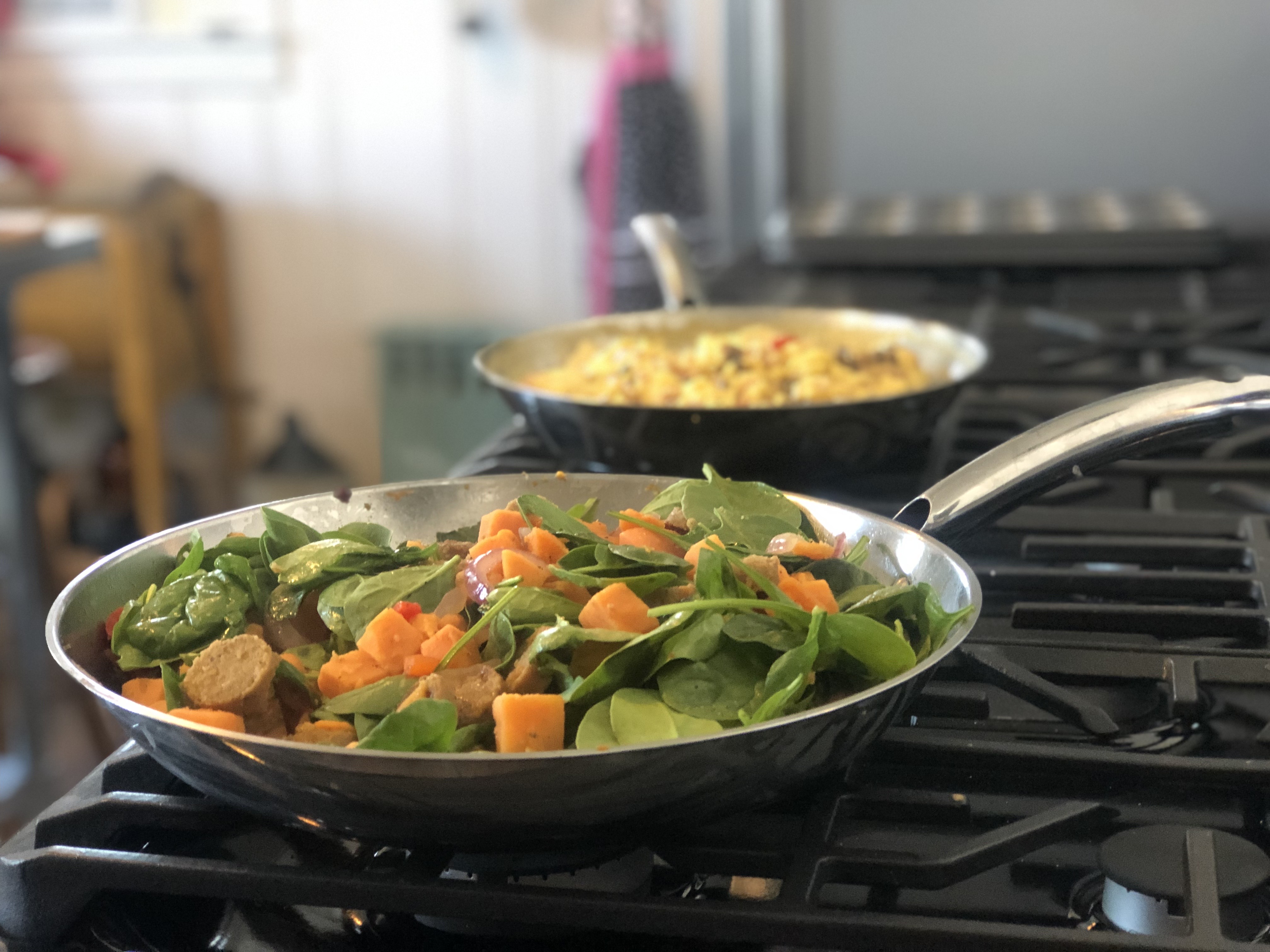 Spinach scramble breakfast cooking on the stove at The Victorian on Main bed & breakfast at The Victorian on Main, Fairfield,