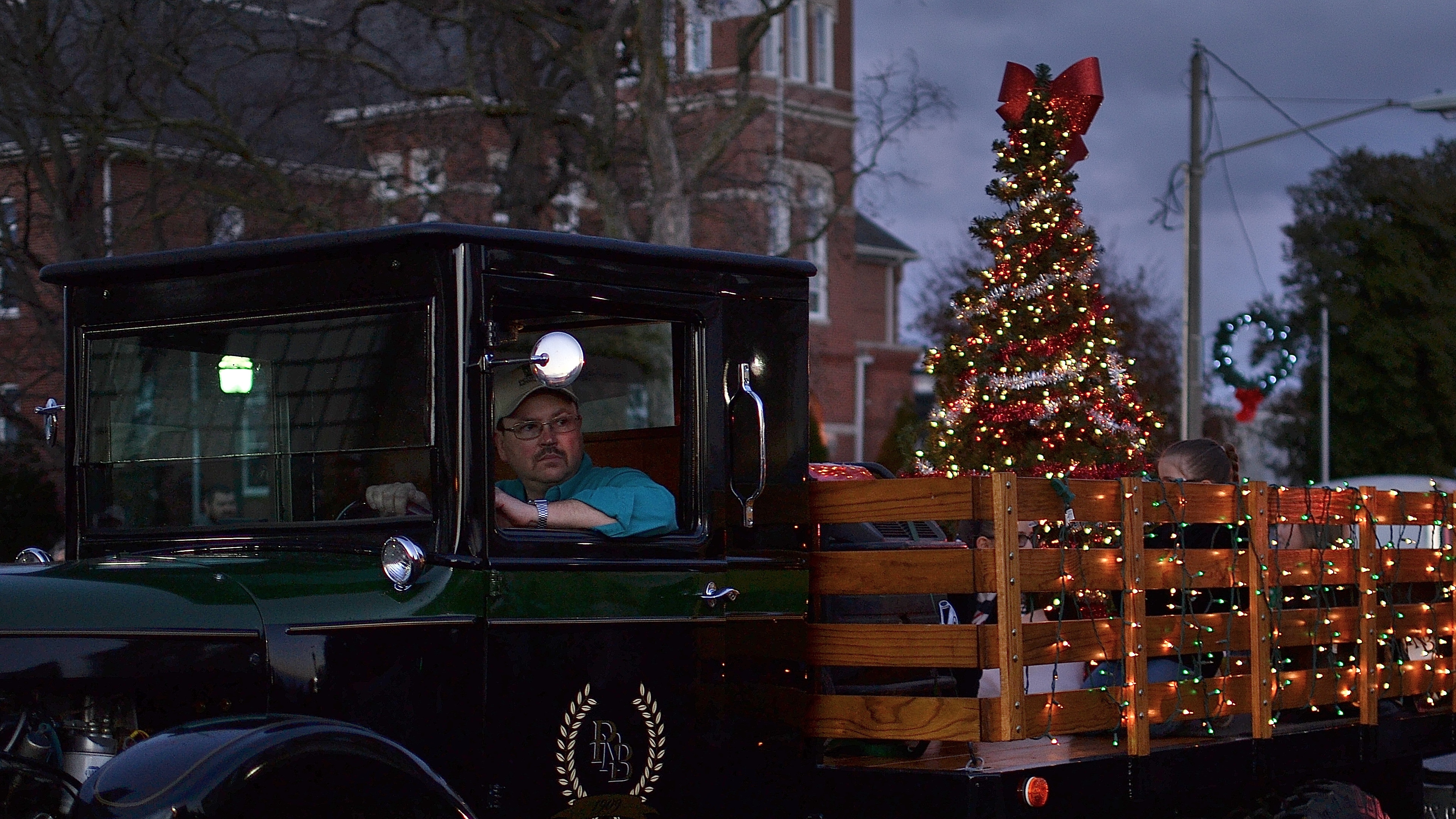 Vintage truck with Christmas tree in Fairfield, Il holiday parade