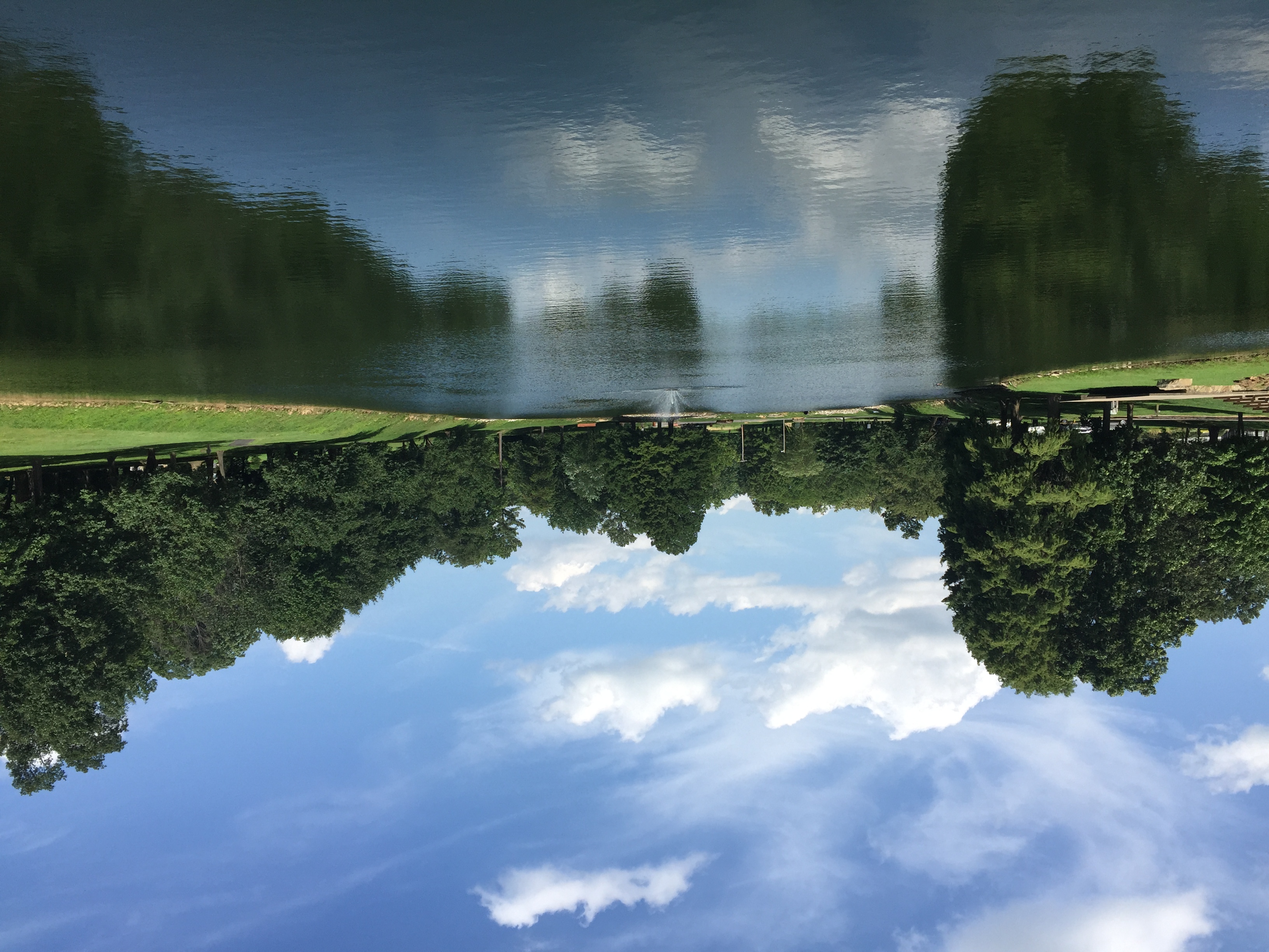 Lake with blue sky at the Leo French Park, Fairfield, Il