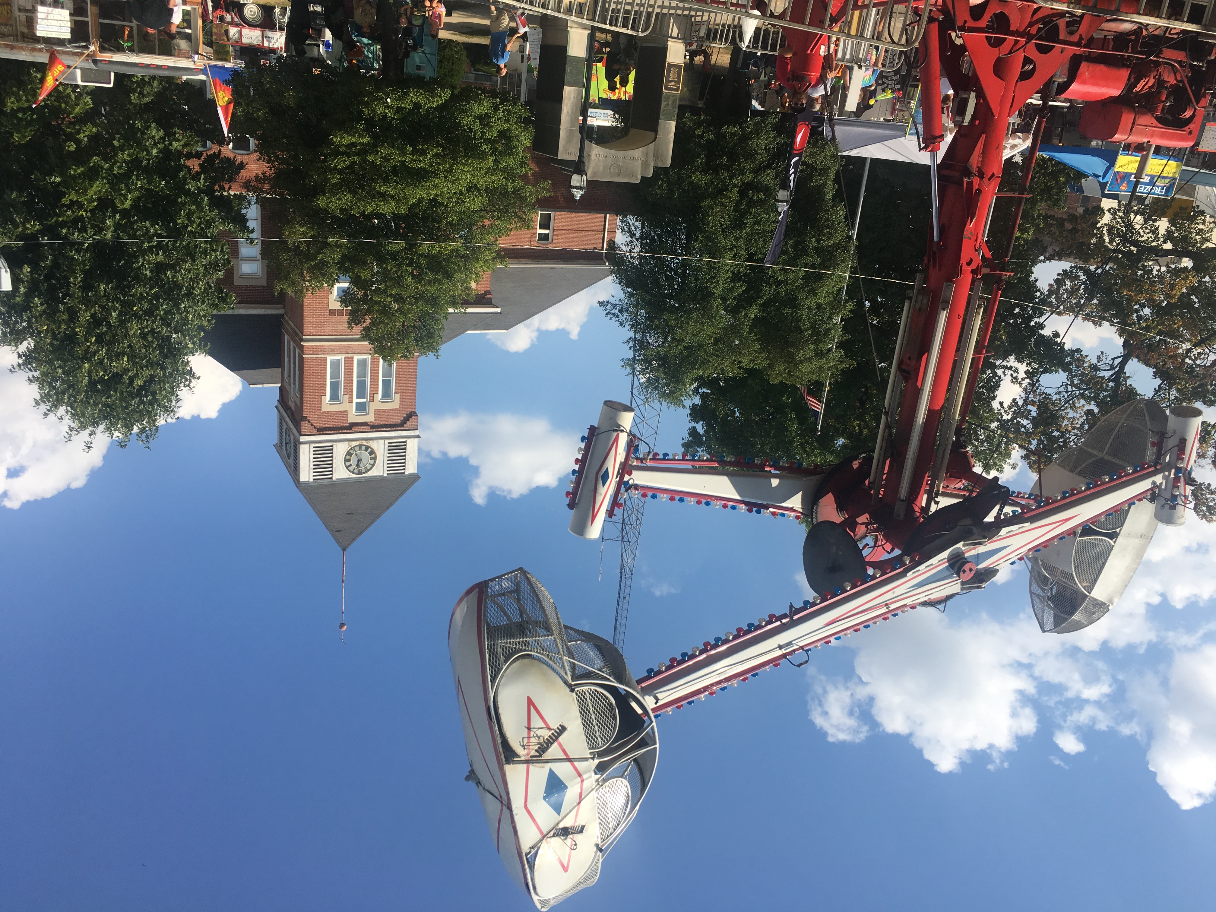 Carnival ride in front of The Wayne County Courthouse, Il