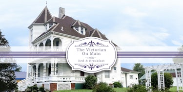 The Victorian on main logo. White and purple color pallet. 1