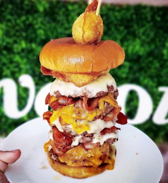 Towering 3-tiered burger