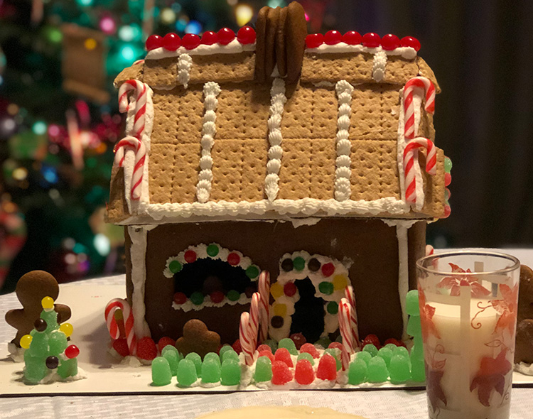Gingerbread House and glass of milk at at The Victorian on Main