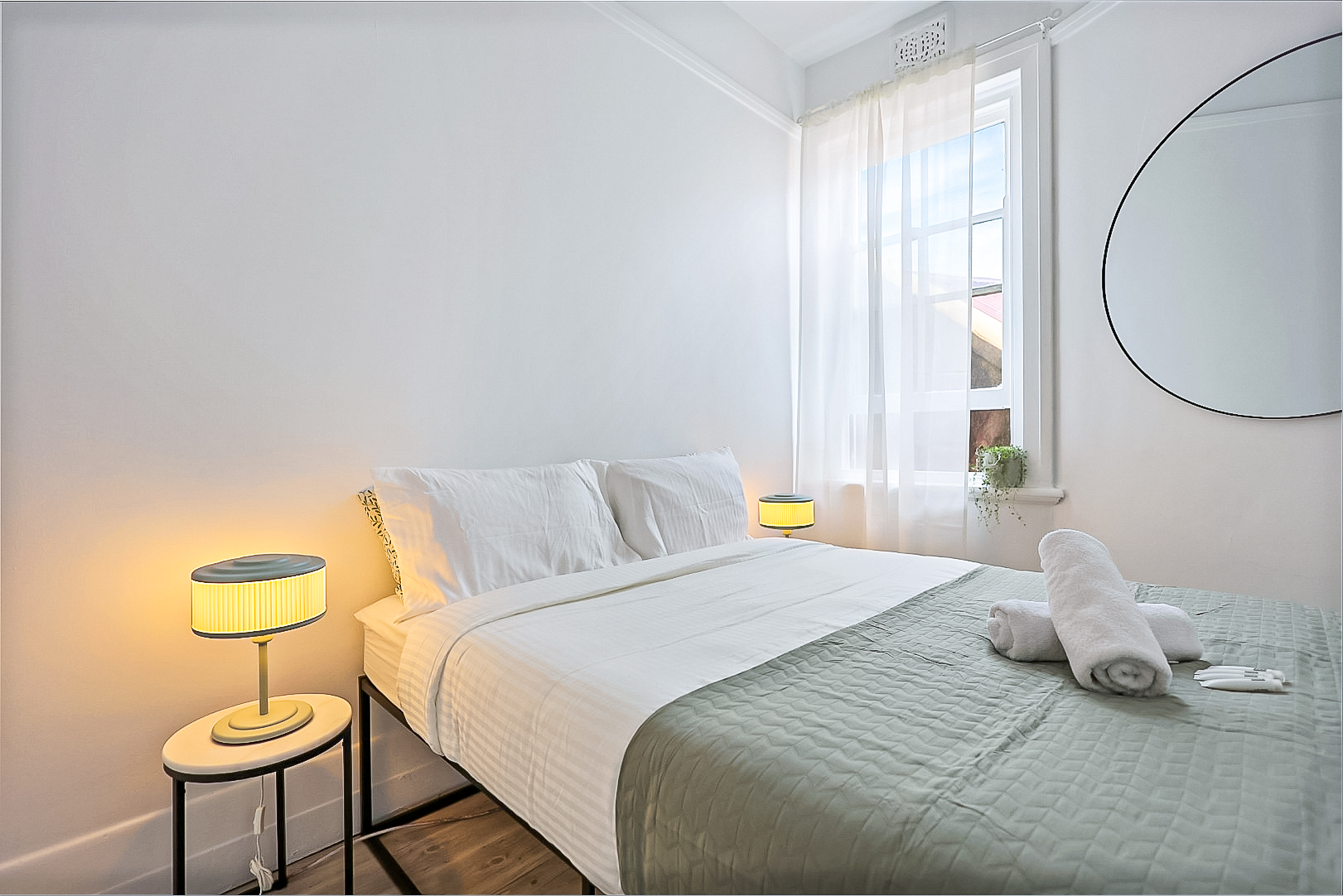 Cosy private double room with complimentary toiletries and towels.