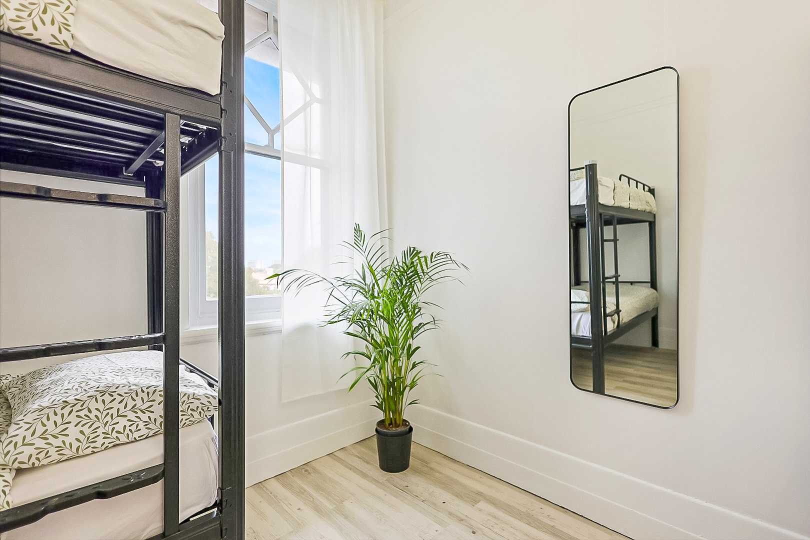 Light and bright 6-person dorm with full length mirror