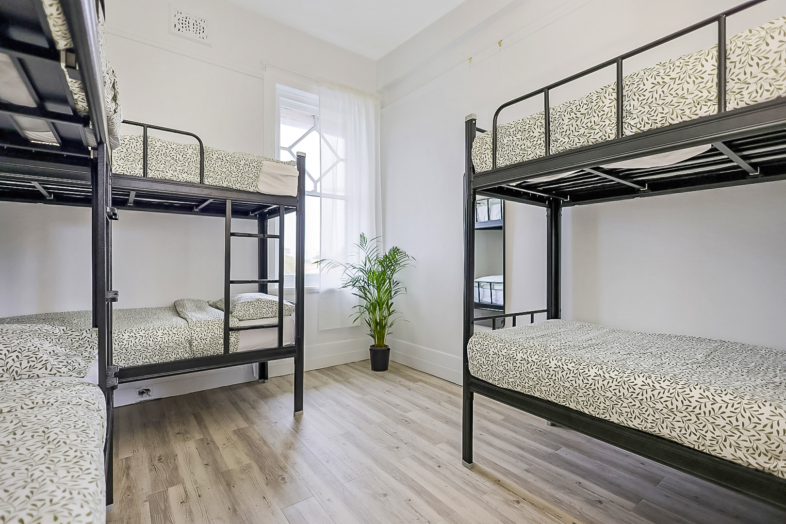 Light and bright 6-person dorm with full length mirror