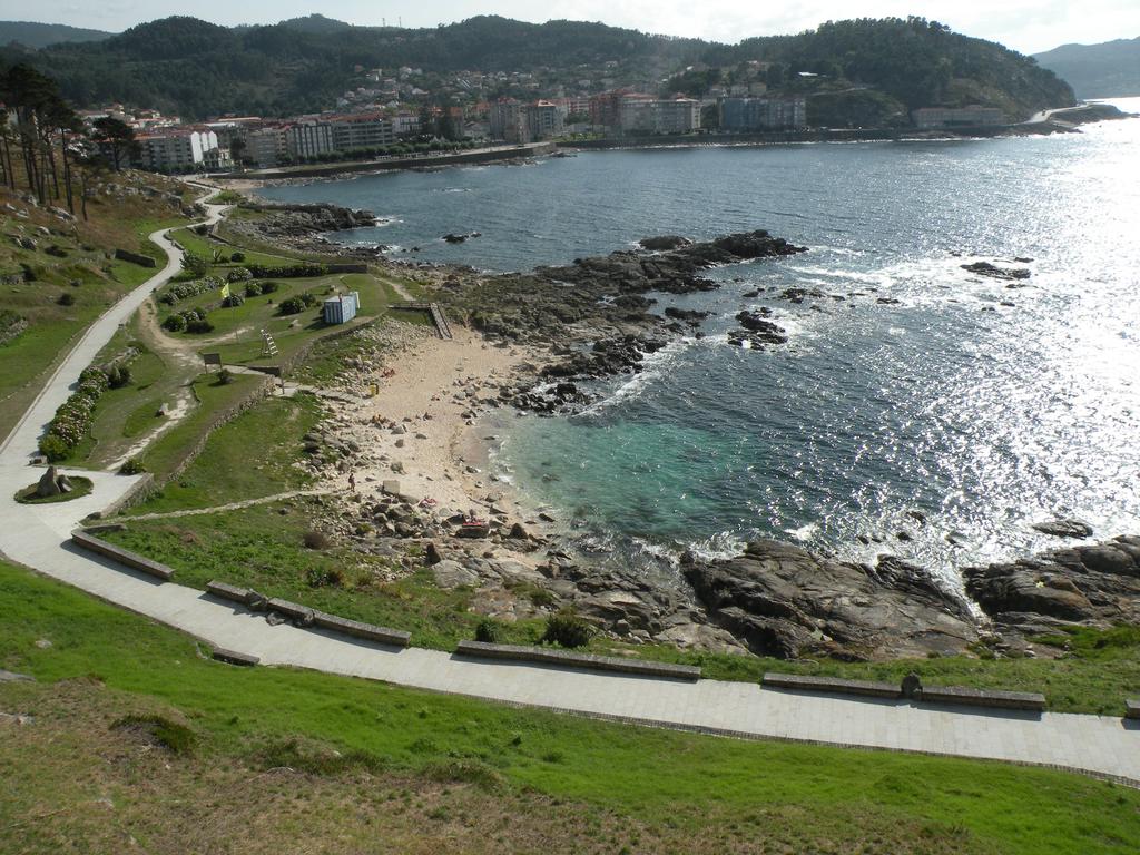View of the Monte Boi seafront promenade with the hotel in the background