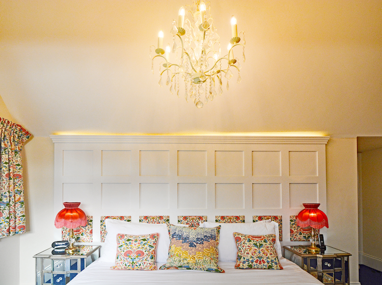 Haven Hall Hotel Bedroom 6 chandelier & bed pillows