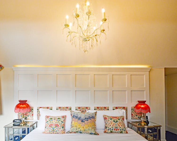 Haven Hall Hotel Bedroom 6 chandelier & bed pillows