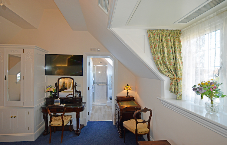 Haven Hall Charles Dickens Room 7 view into Shower Room