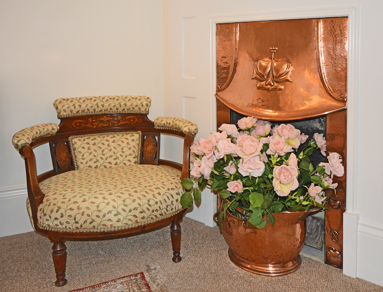 Haven Hall Hotel Room 4 fireplace & chair