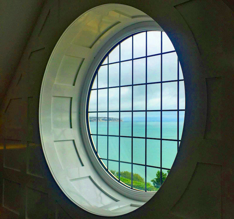 Haven Hall Hotel Penthouse View of Culver Cliff through Round Window
