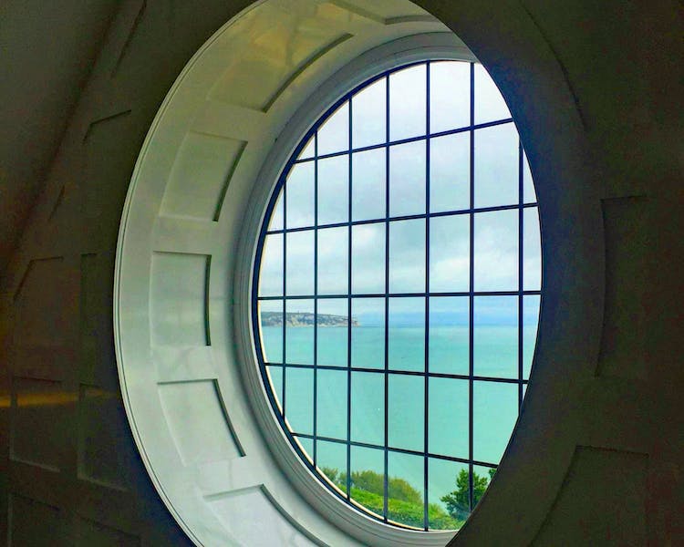 Haven Hall Hotel Penthouse View of Culver Cliff through Round Window