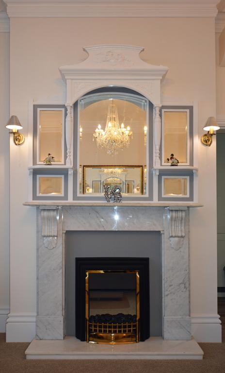 Haven Hall Hotel . Gypsophila Suite living room fireplace