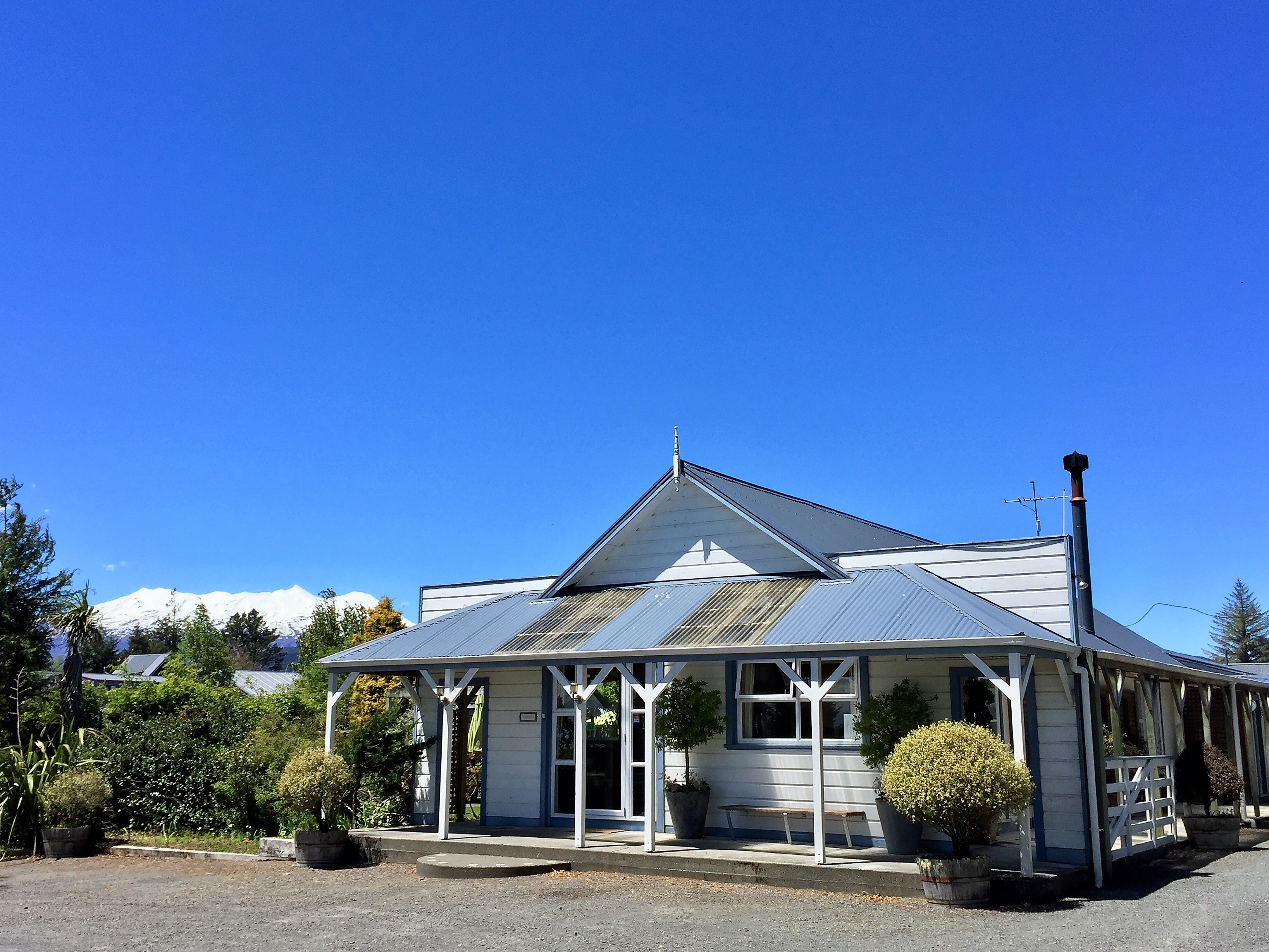 Tongariro Crossing Lodge front entrance with view of Mt Ruapehu in the background 1