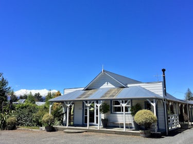 Tongariro Crossing Lodge front entrance with view of Mt Ruapehu in the background 1