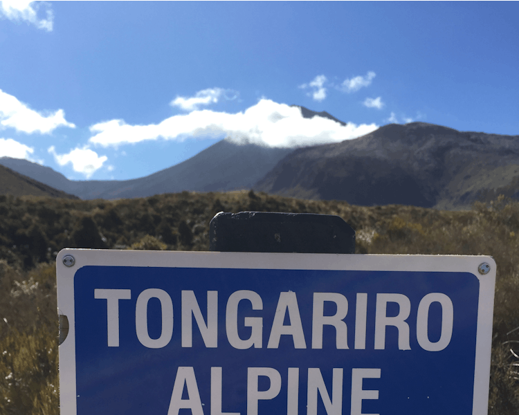 Start of the Tongariro Alpine Crossing sign with 19.4km to go.