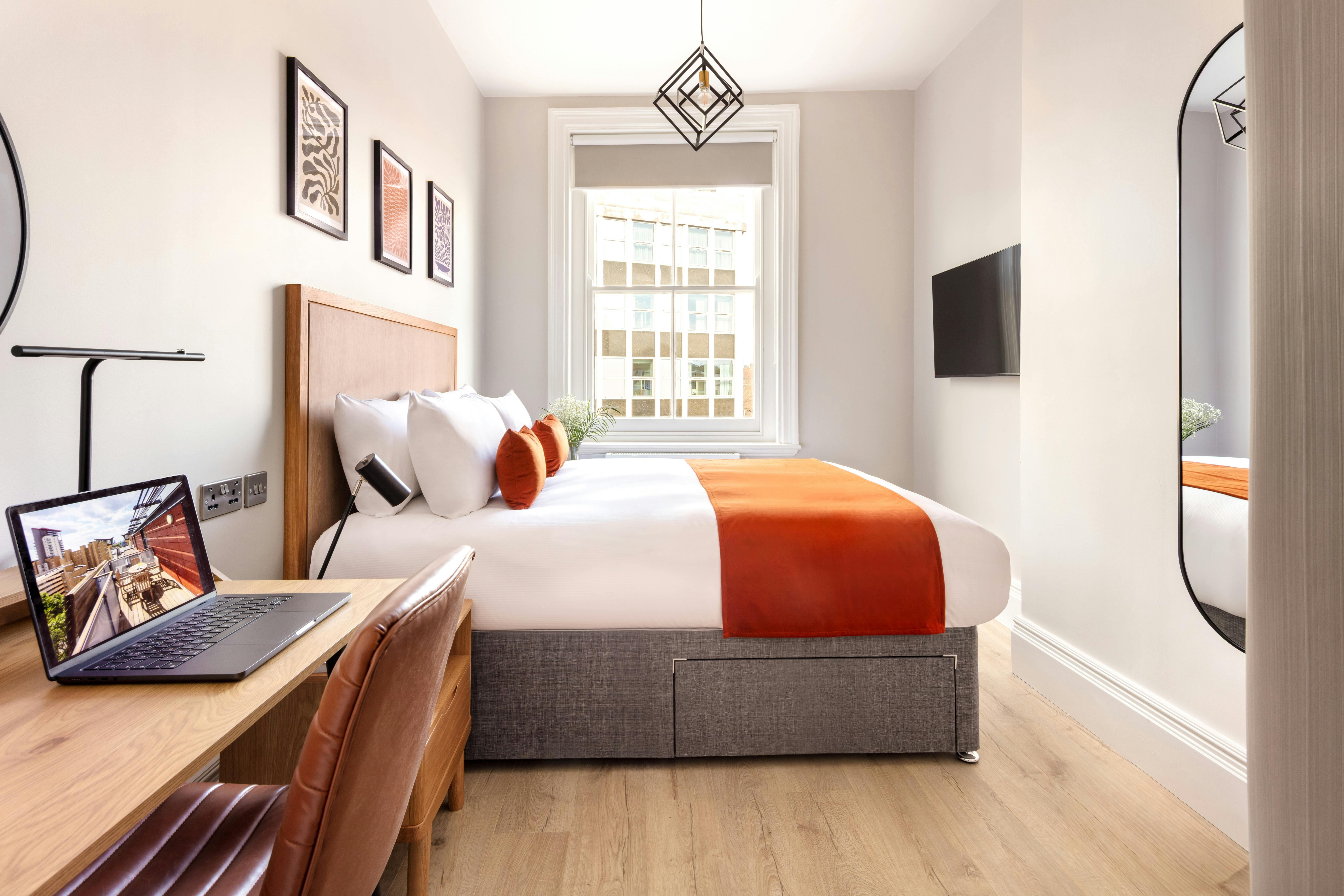 modern bedroom with large double bed