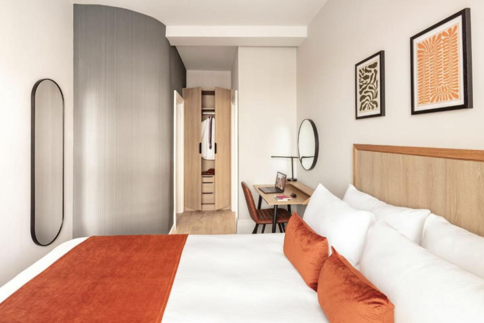 modern bedroom with large double bed and ensuite