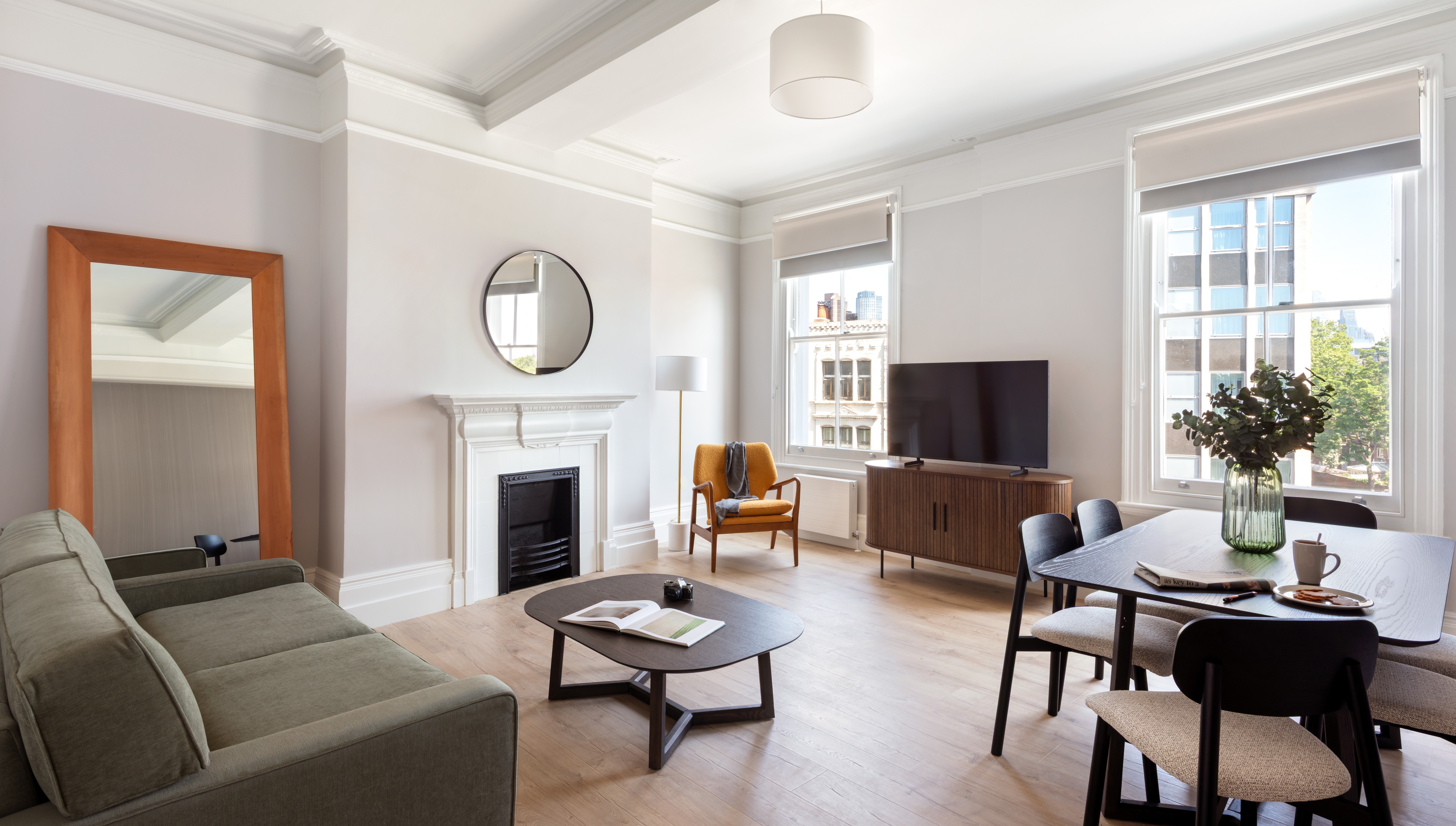 Spacious Modern Living space with seating area and sofabed