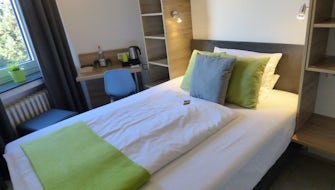 Room with queen-size bed