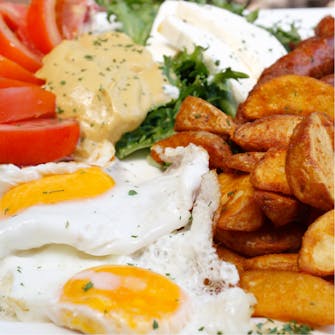 Breakfast foods such as eggs and breakfast potatoes.