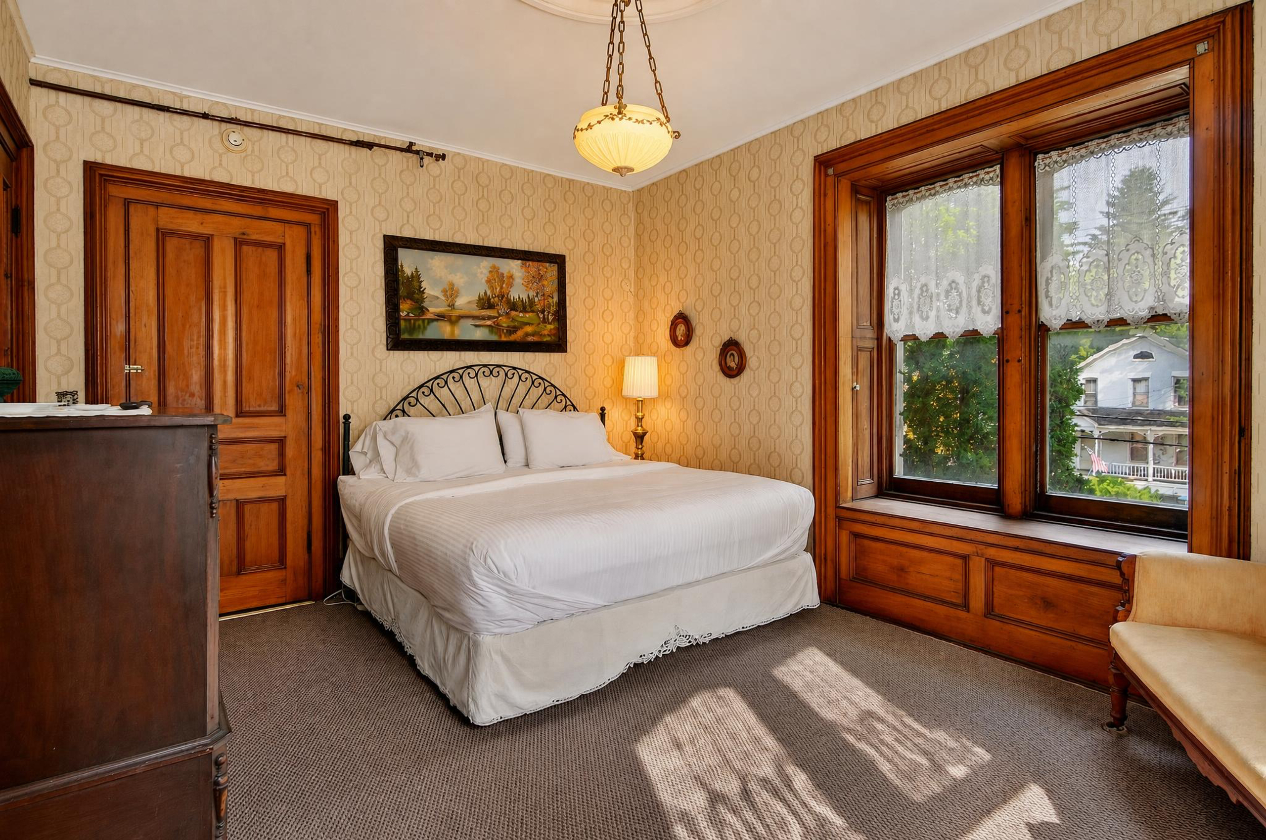 Room 1: King Bed w/ Private En Suite Bath
