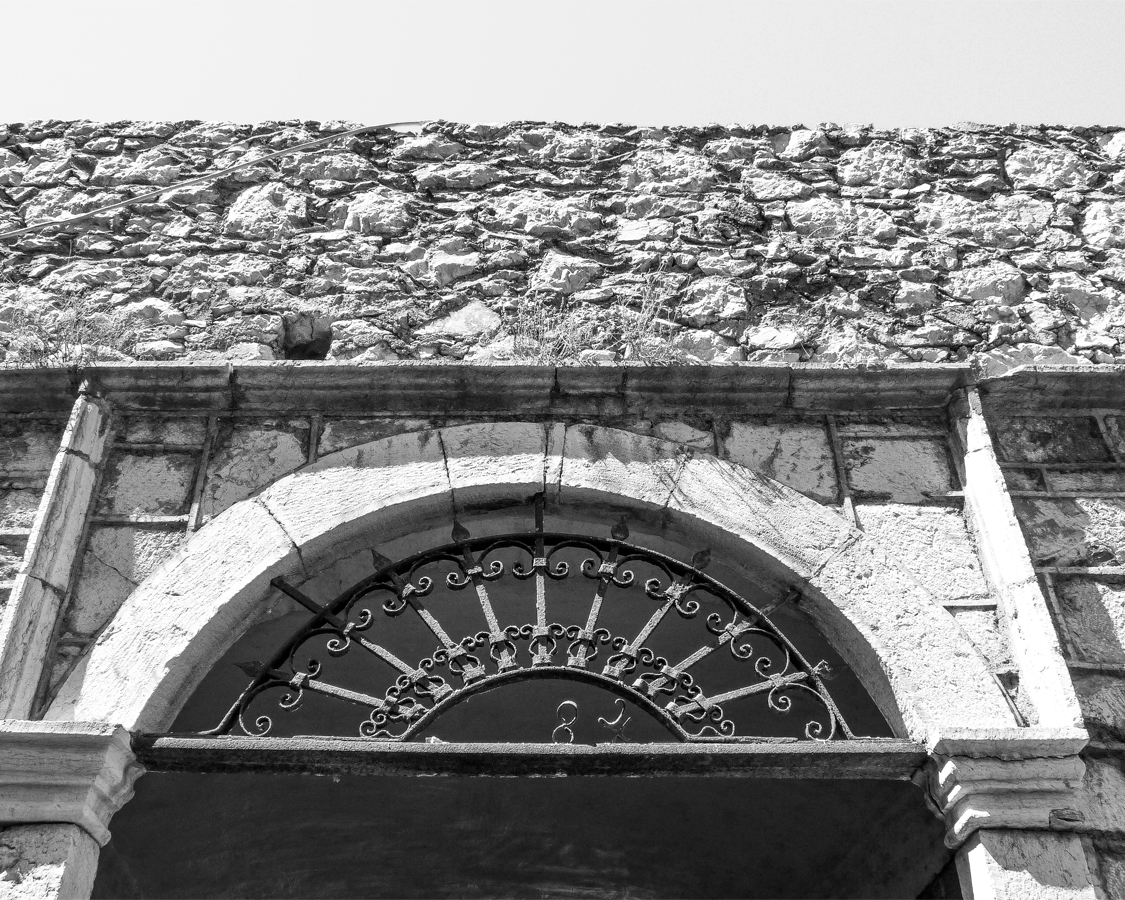The Old Markets - Pre Restoration metal gated entrance