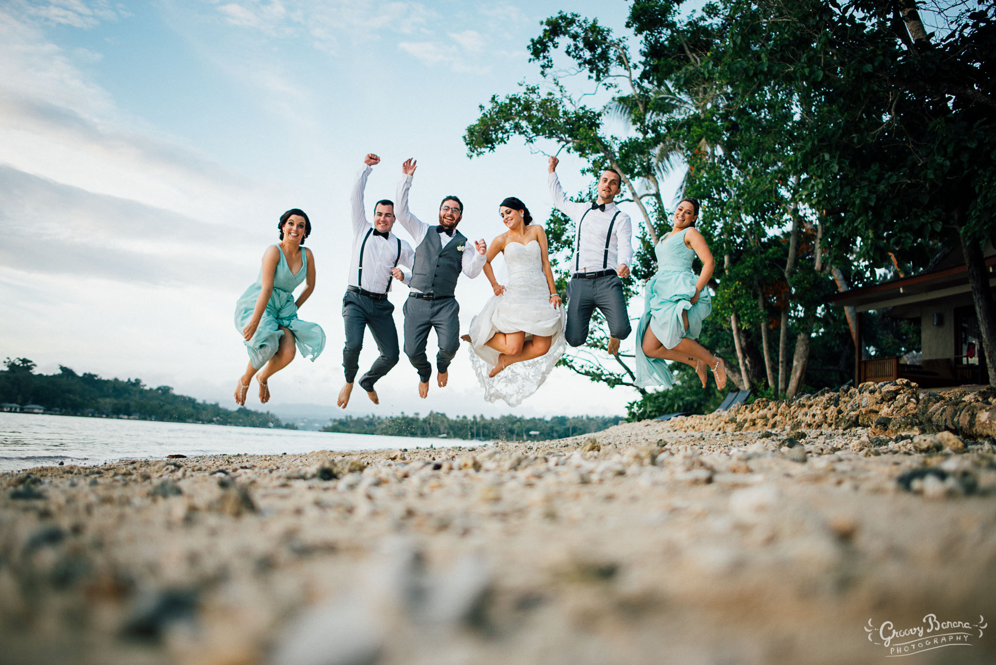 Jumping for joy on beautiful Sunset Beach #erakorbeachweddings #weddingceremonyonthebeachsouthpacific #vanuatuislandweddings