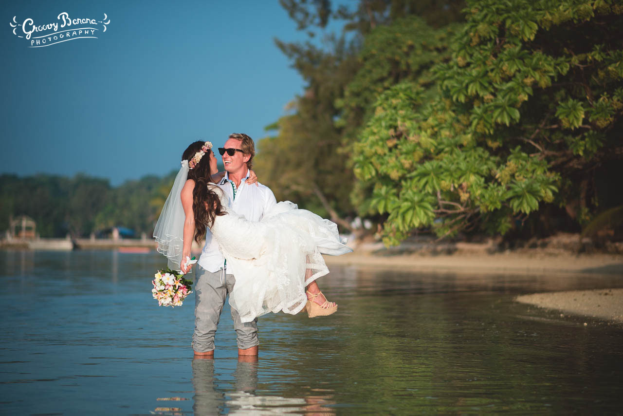 Bride and groom in Erakor Lagoon #erakorbeachweddings #weddingceremonyonthebeachsouthpacific #Vanuatutropicalbeachweddings