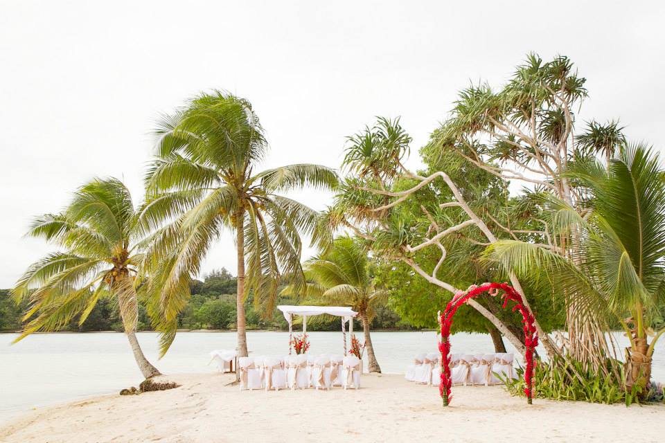 Coconut Beach Wedding Ceremony #erakorweddings #weddingceremonyonthebeach #Vanuatutropicalbeachweddings floral arch
