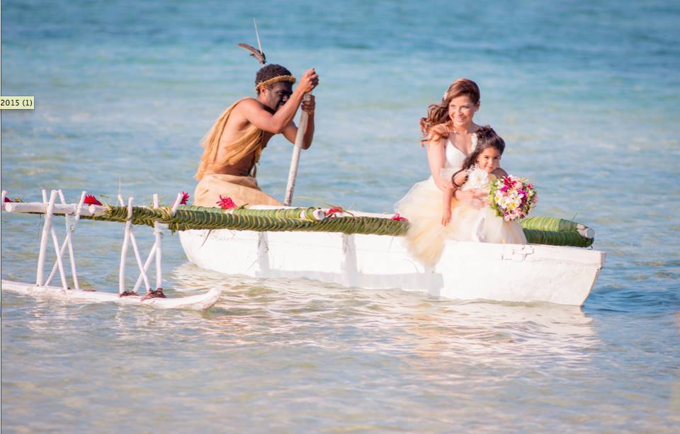 Bride & Flowergirl on the Outrigger Canoe #erakorbeachweddings #weddingceremonyonthebeachsouthpacific