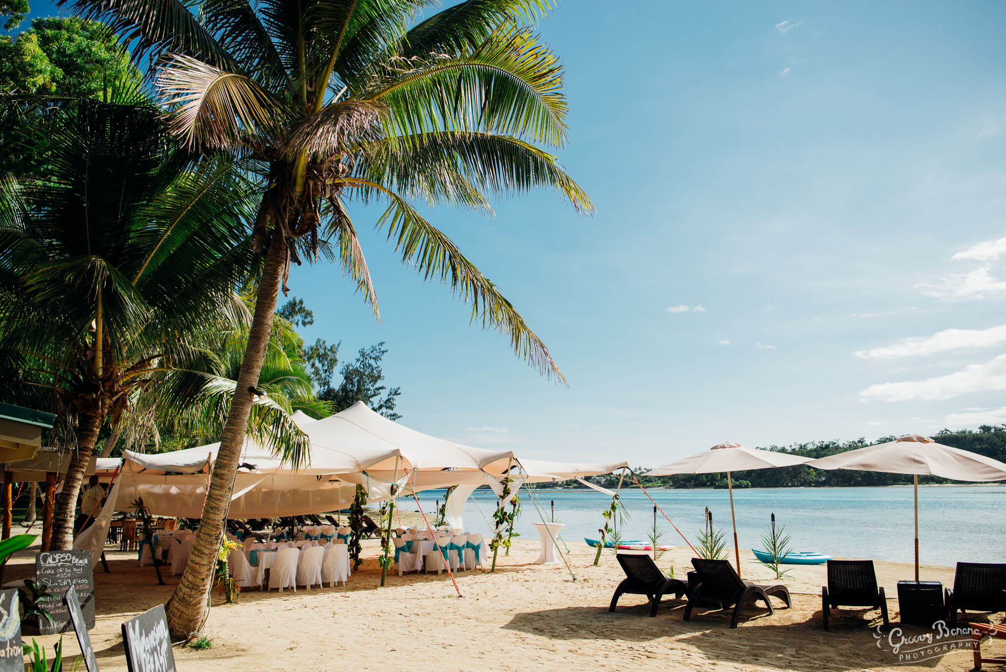 Calypso Beach Wedding Reception under the marquee #erakorbeachweddings #weddingreceptionthebeachsouthpacific