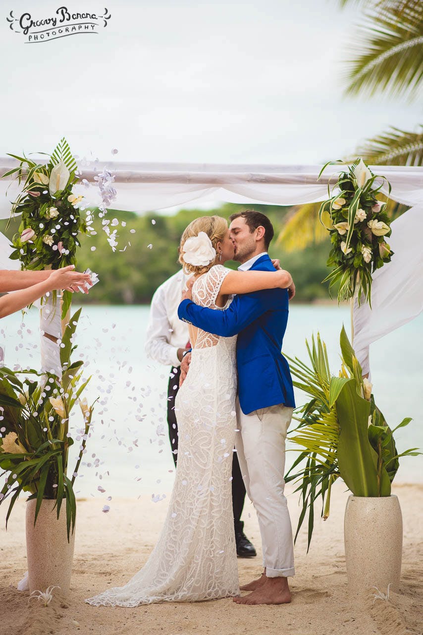 Bamboo Canopy and tropical blooms #erakorweddings #weddingceremonyonthebeach #Vanuatutropicalbeachweddings