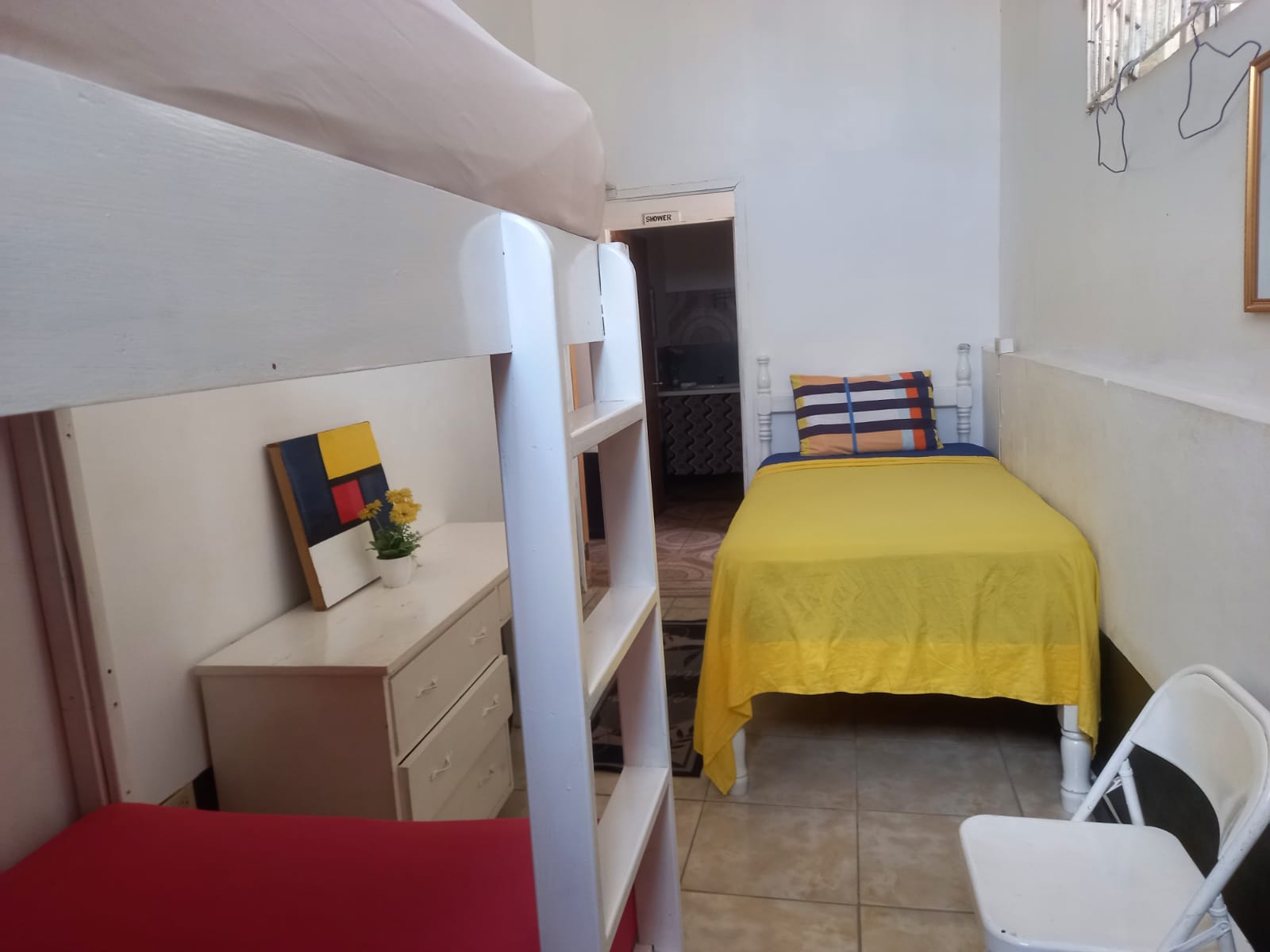 Room 1 Triple Room with shared bathroom.