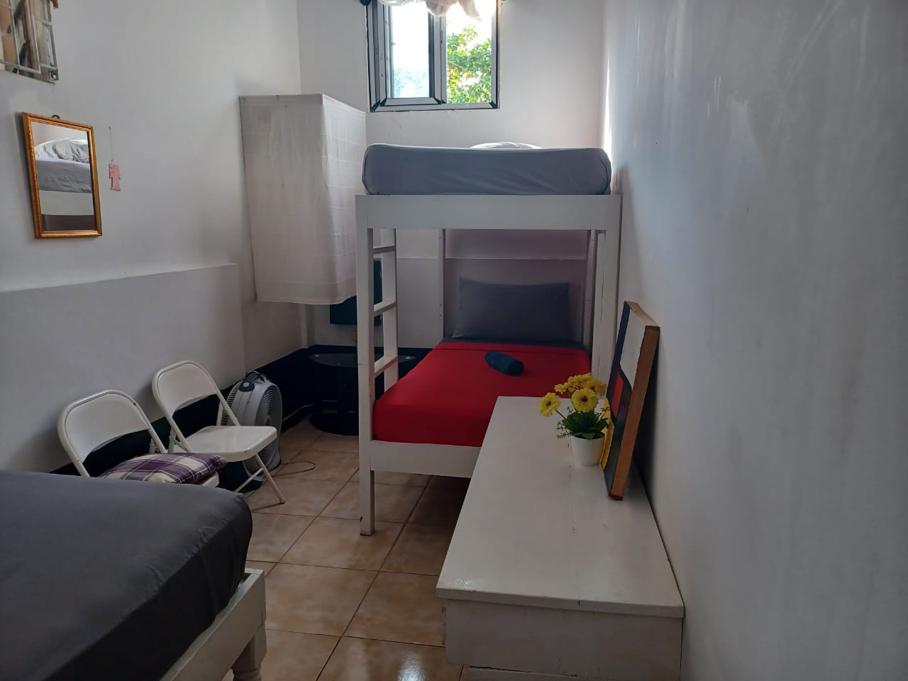 Room 1 Triple Room with shared bathroom.