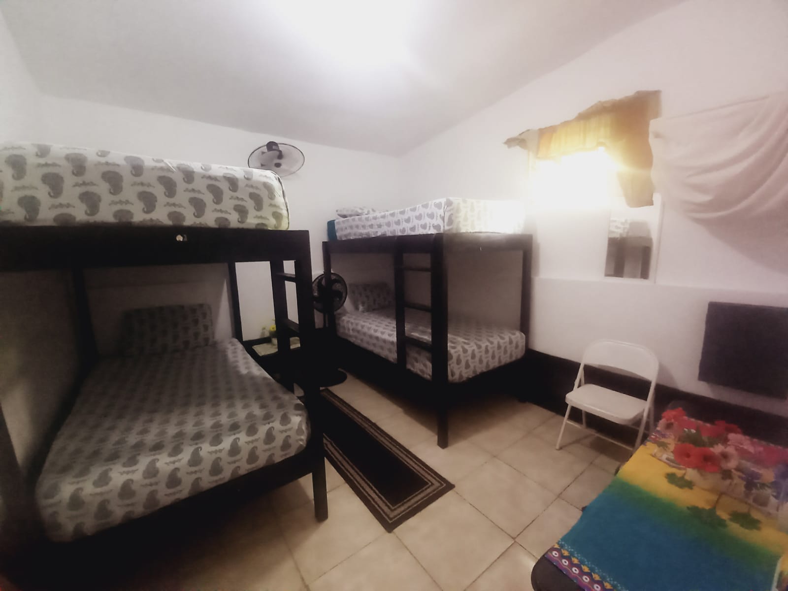 Room 5 Dorm Room with shared bathroom.