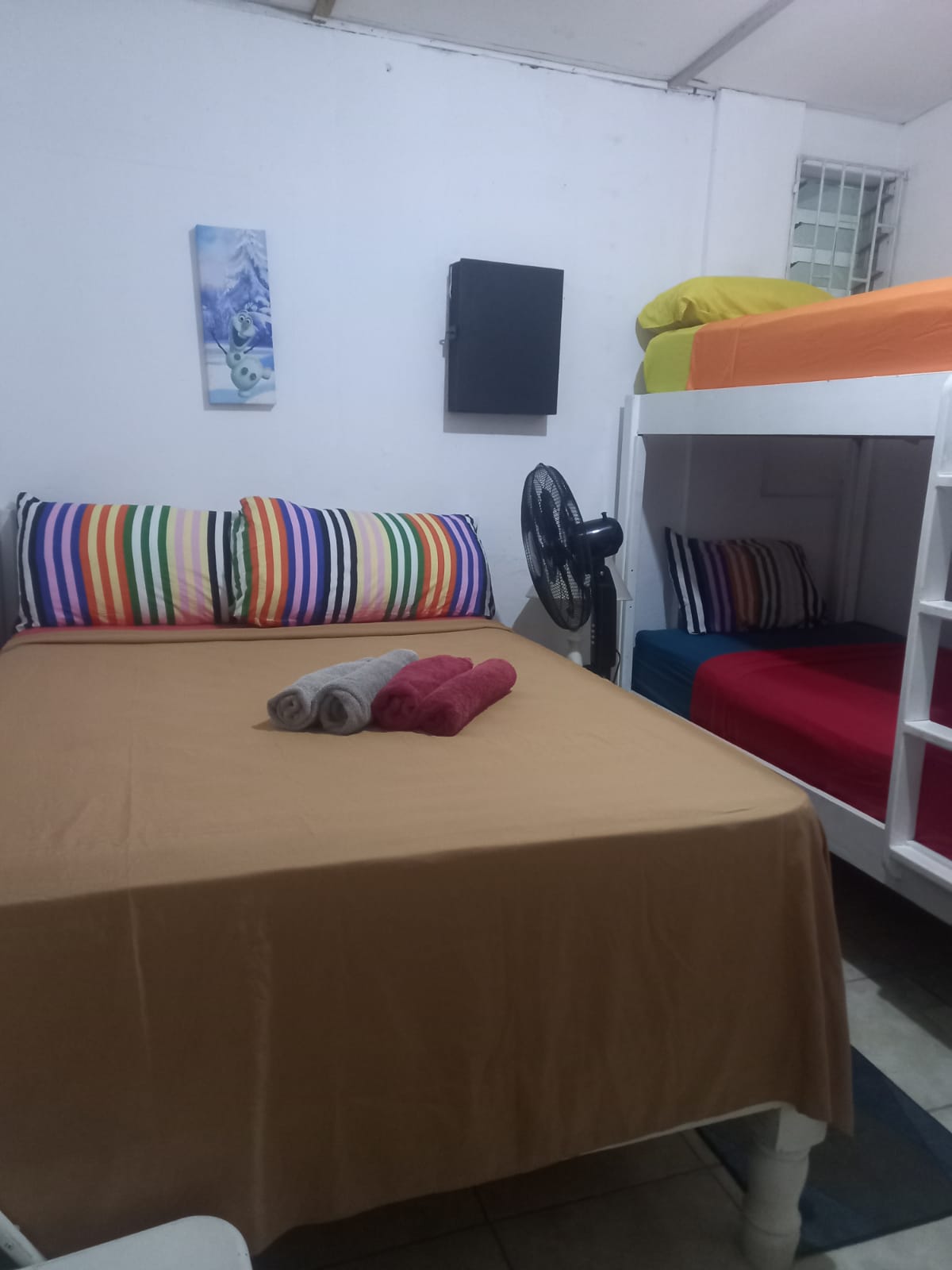 Room 4 Quadruple family Room with shared bathroom.