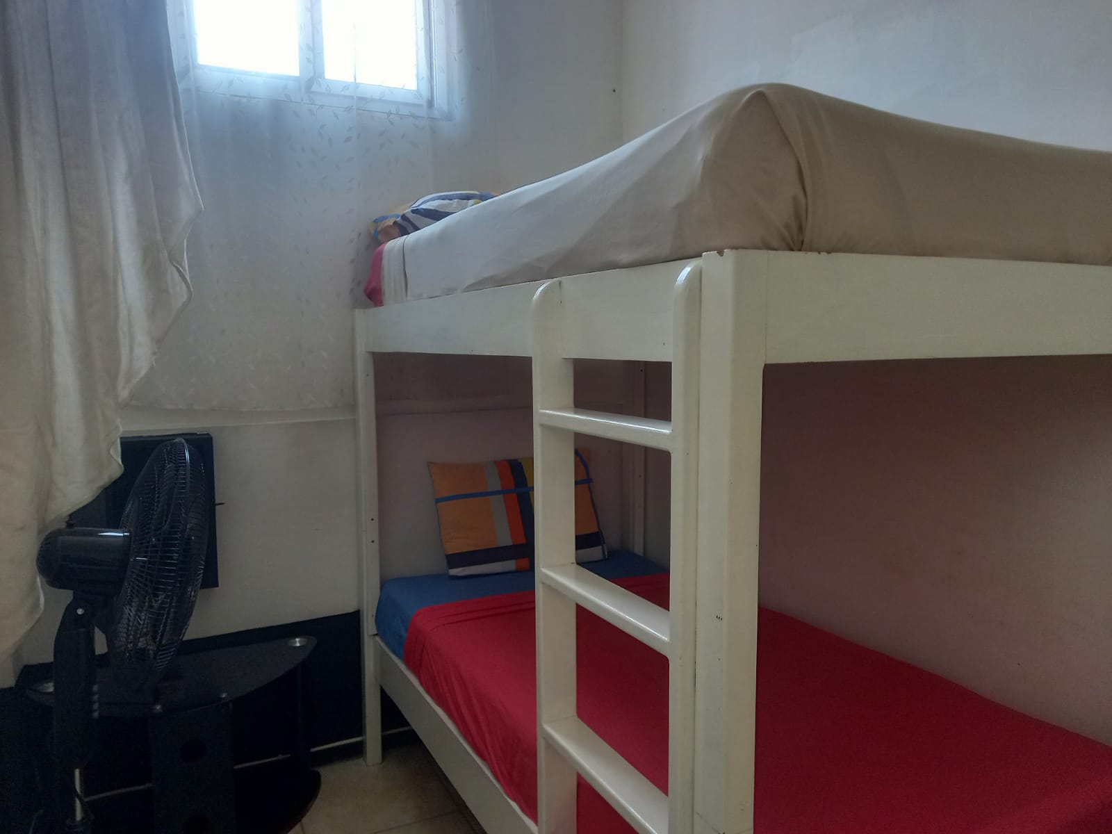 Room 1 Triple Room with shared bathroom.