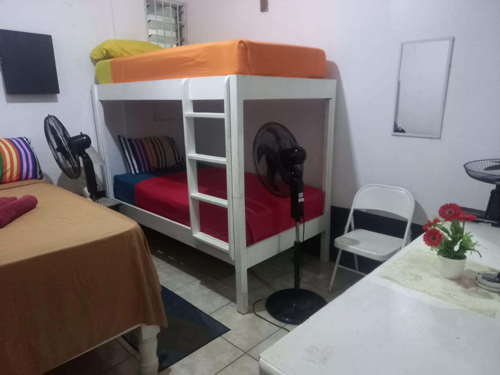 Room 4 Quadruple family Room with shared bathroom.