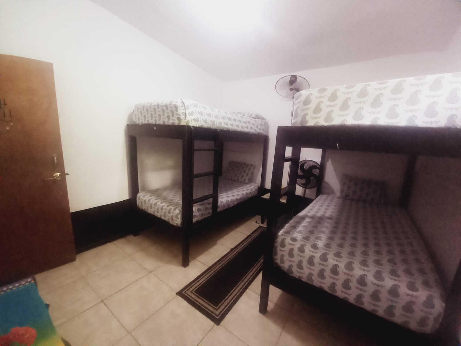 Room 5 Dorm Room with shared bathroom.