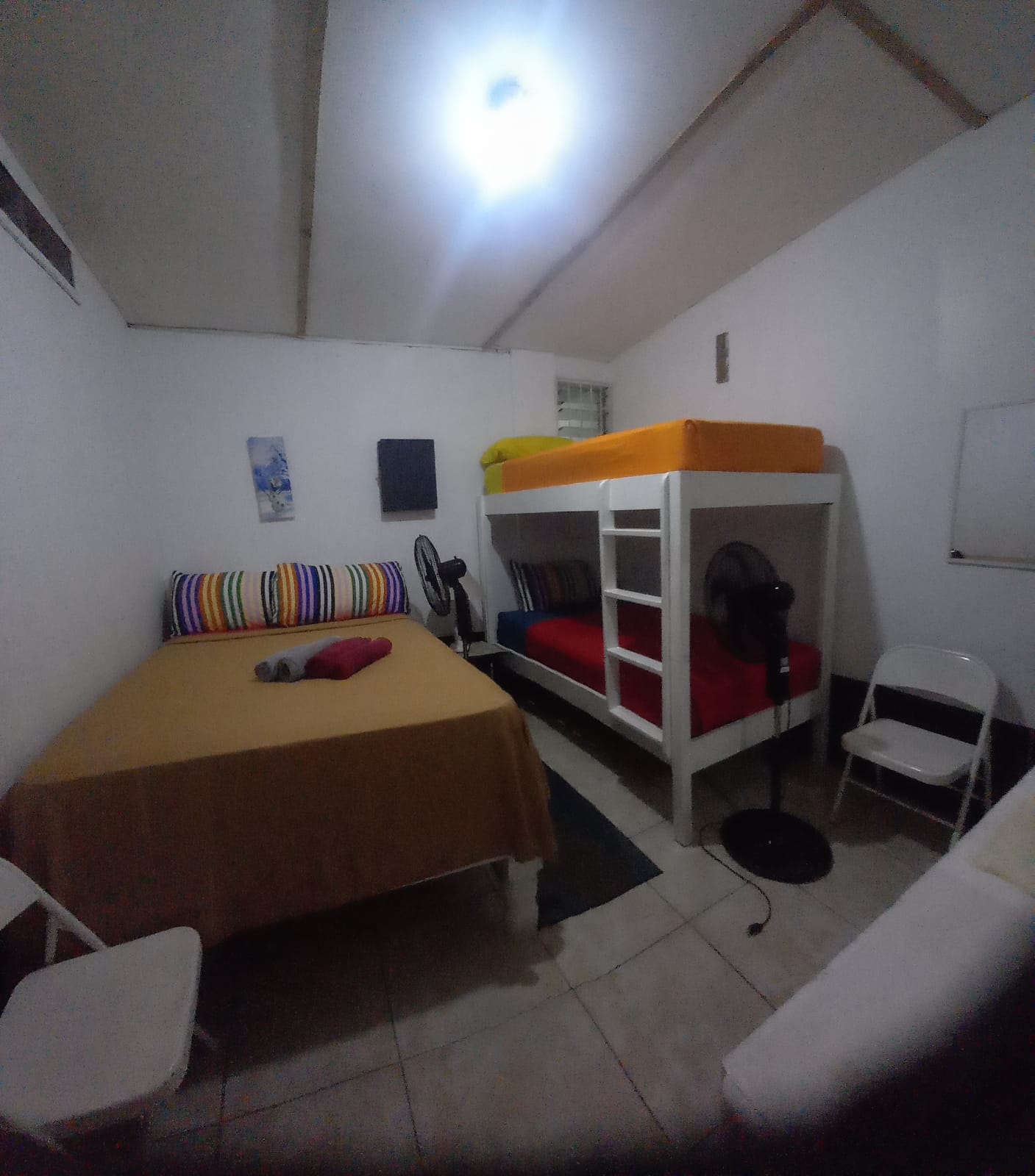 Room 4 Quadruple family Room with shared bathroom.