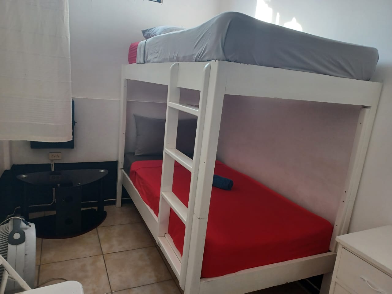 Room 1 Triple Room with shared bathroom.