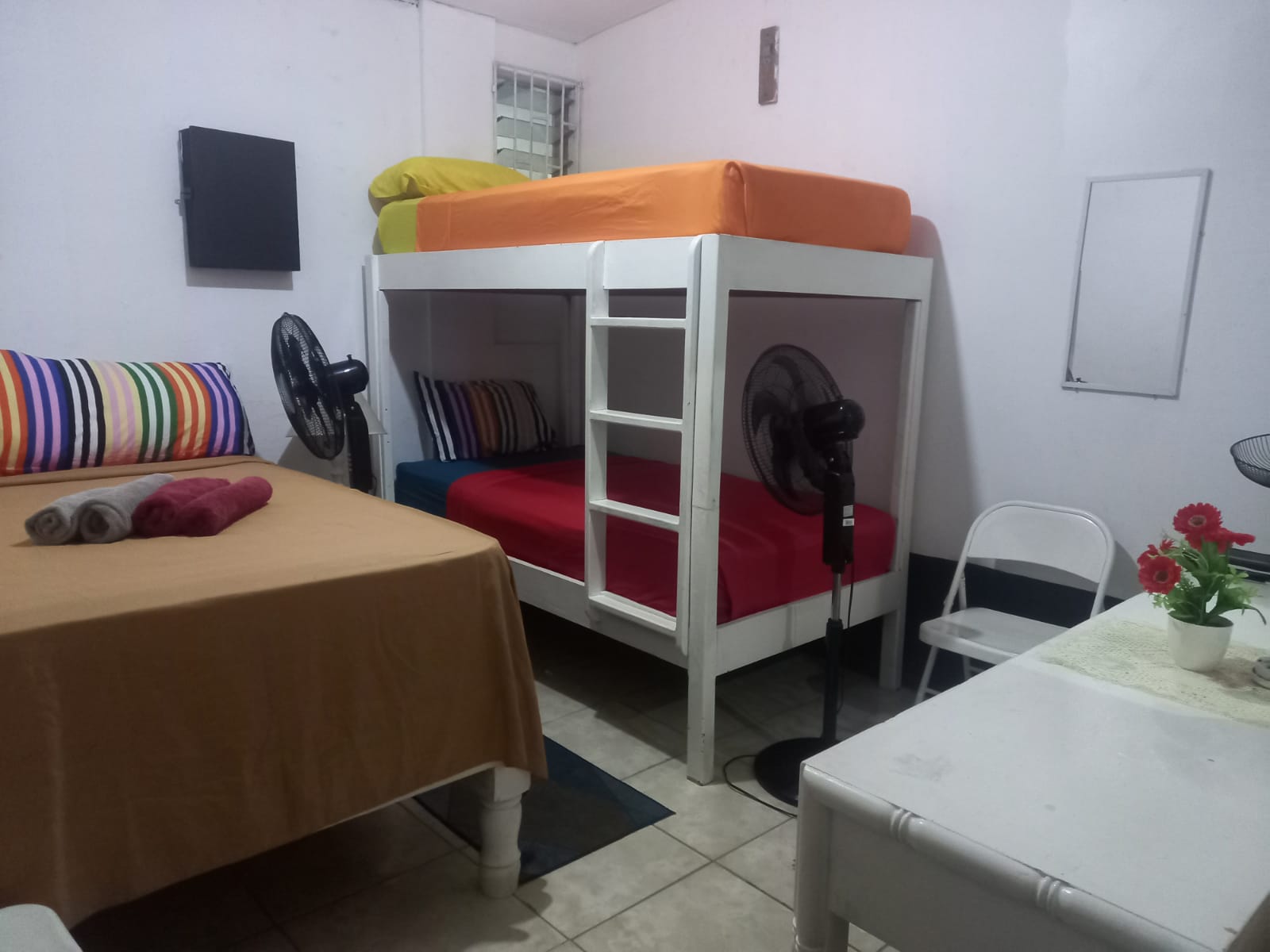 Room 4 Quadruple family Room with shared bathroom.