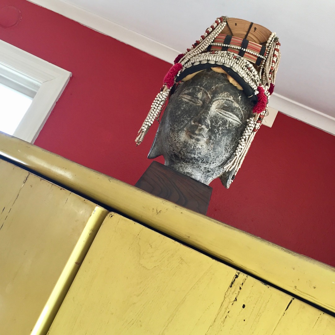 Buddha head with Thai minority tribeswomen headress