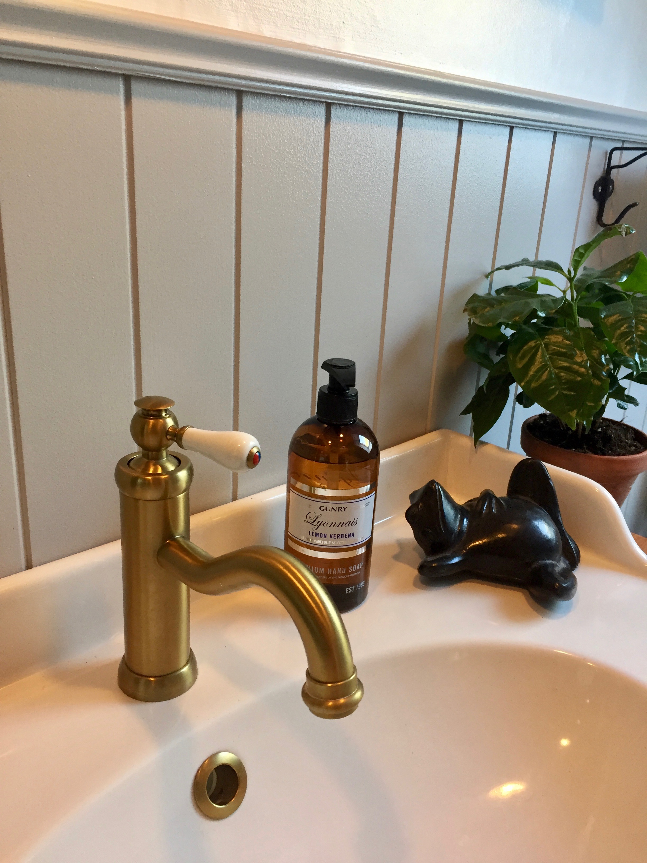 Brass taps in bathrooms