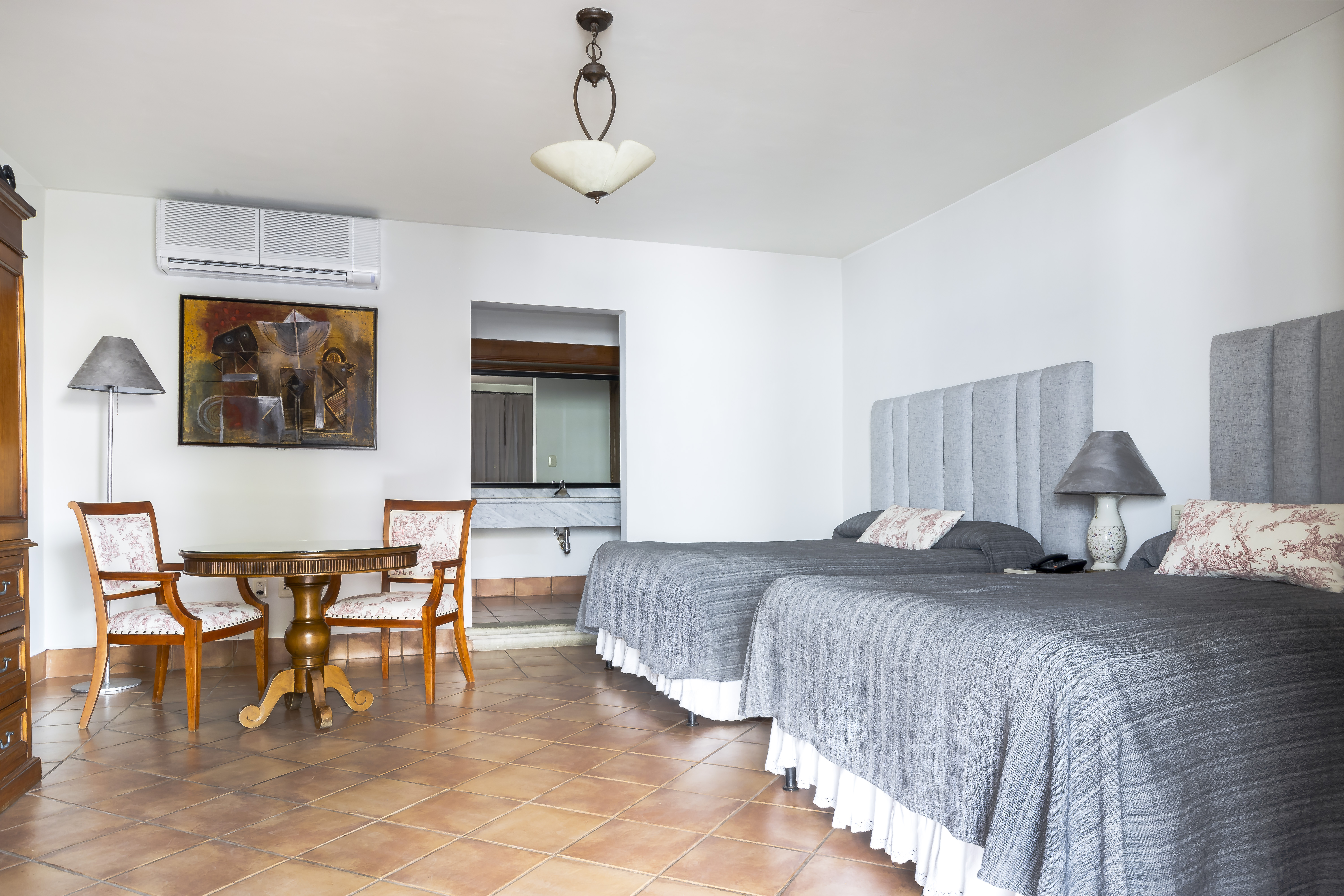 Junior Suite con 2 camas matrimoniales.