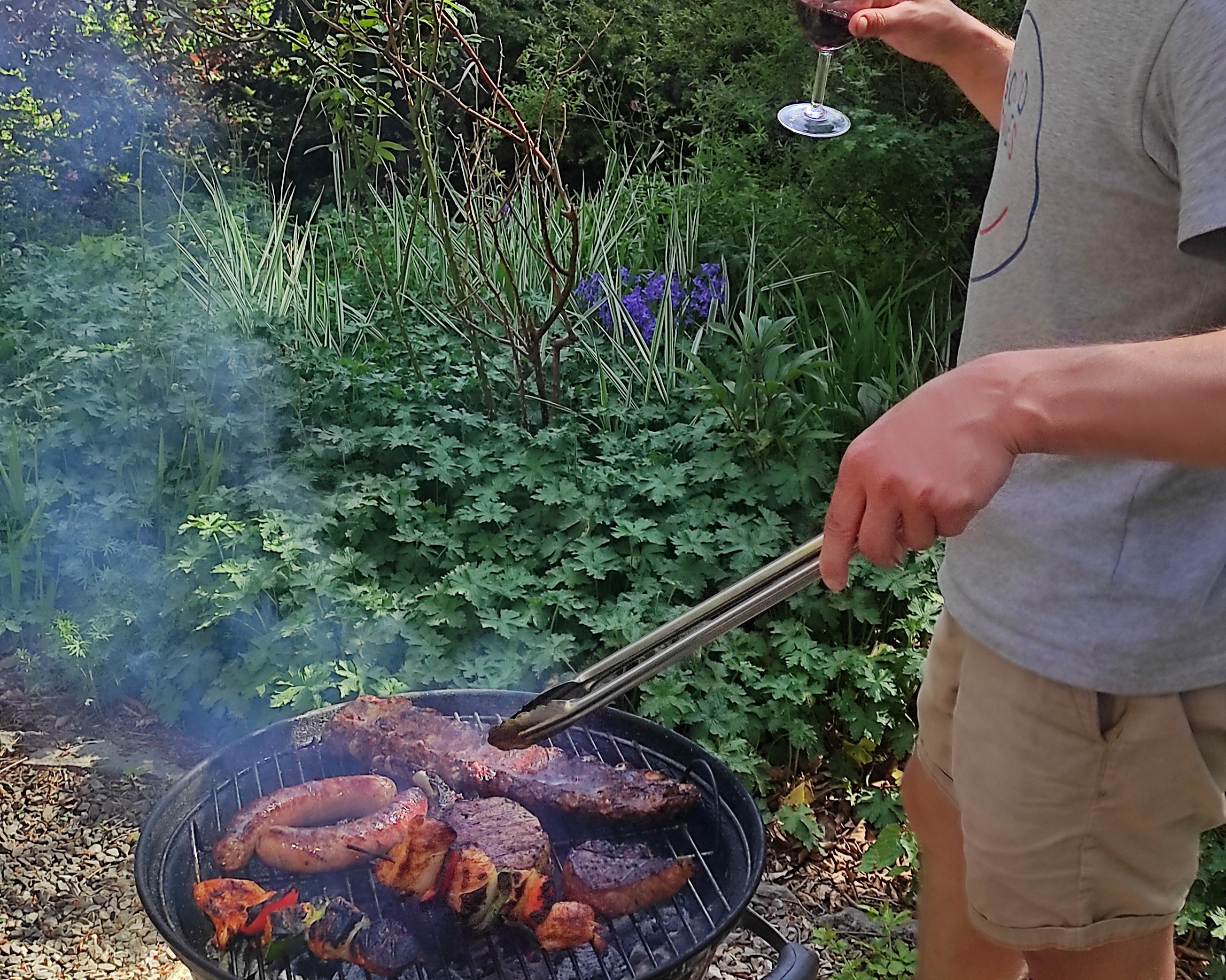 Enjoying a barbecue after a day of biking and hiking outdoors at La Maison Vienvenue