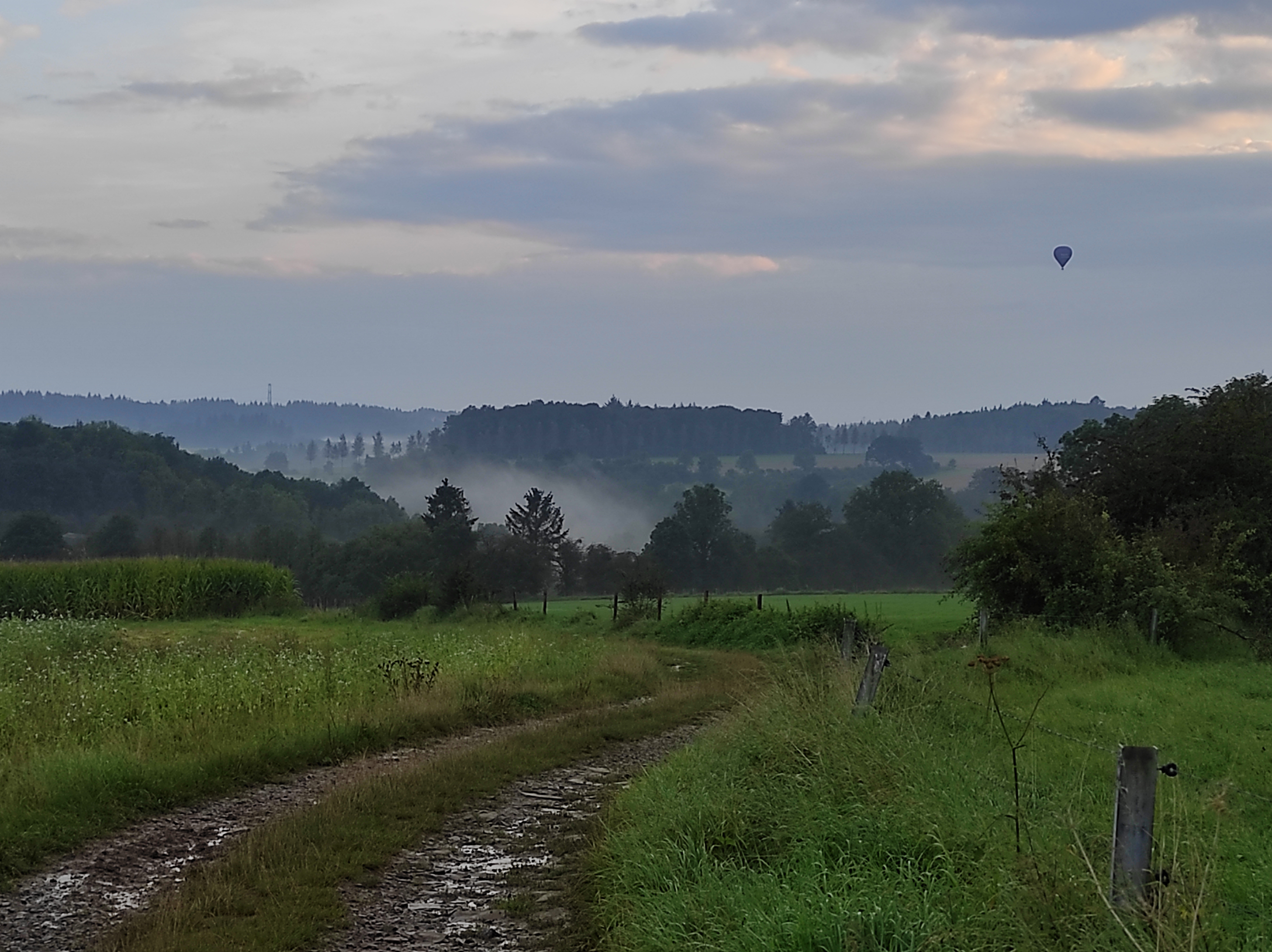 Panoramic misty view from a hiking or biking recommended route near La Maison Vienvenue.